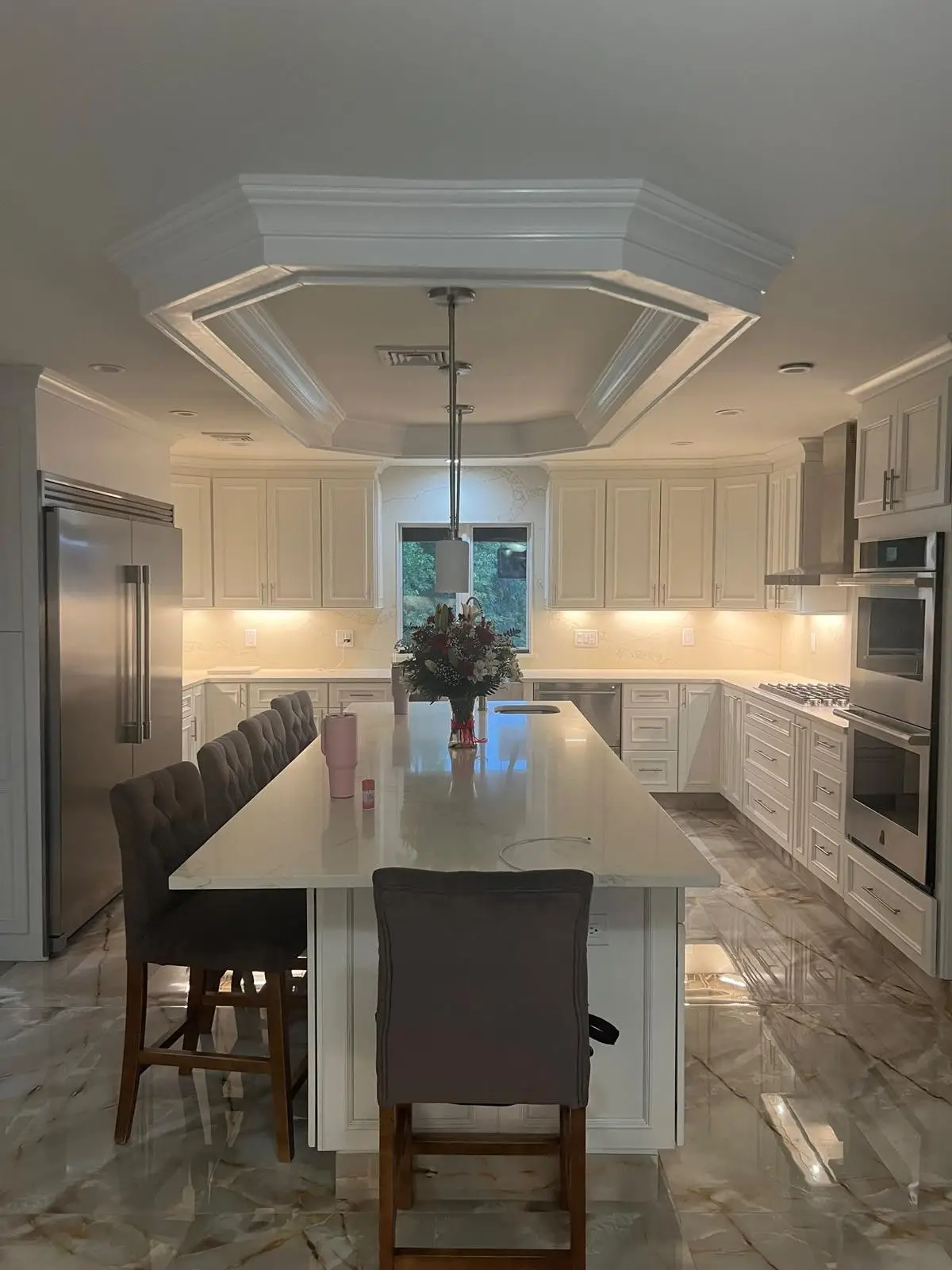 Finished kitchen remodel with white cabinets in Clifton, NJ
