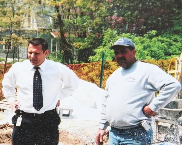 Omar Atallah on a job site with a client in New Jersey